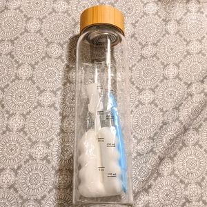Clear glass water bottle cooler